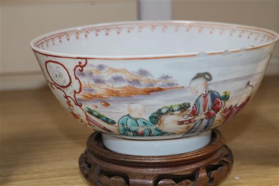 An 18th century Chinese famille rose bowl, wood stand